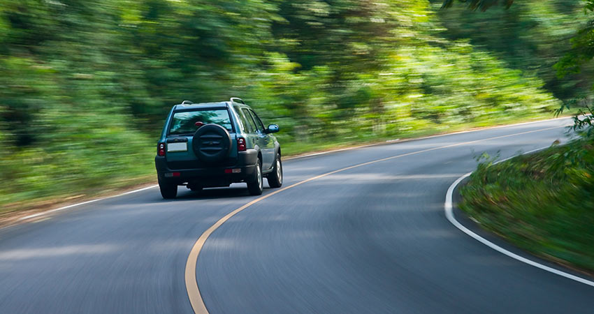 Car cornering on highway Car cornering on highway