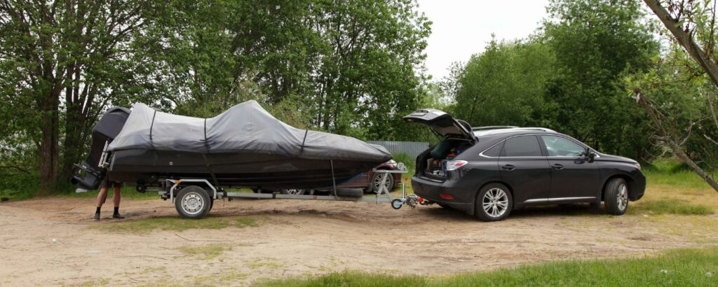 Car towing trailer